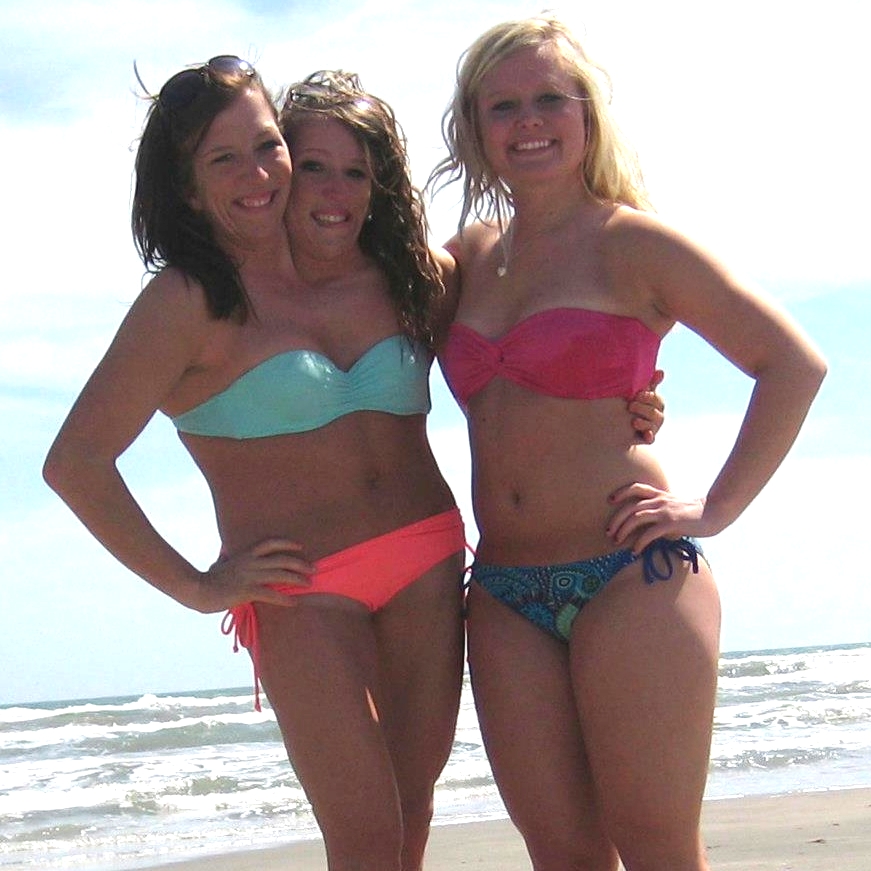Abby and Brittany Hensel bikini on beach. 